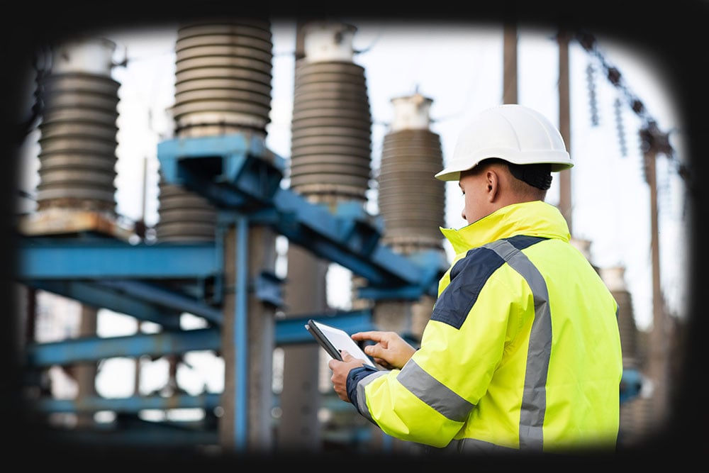 Utility engineer using document management in the field