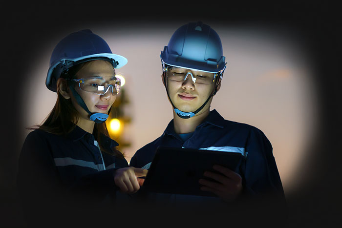 chemical-engineers watching video on tablet